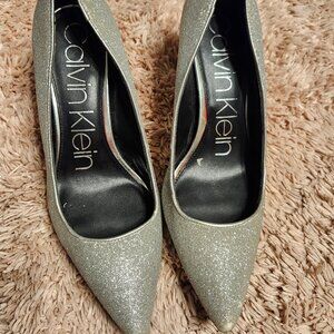 Calvin Klein, stiletto heels, color is silver with glitter, size 8.5